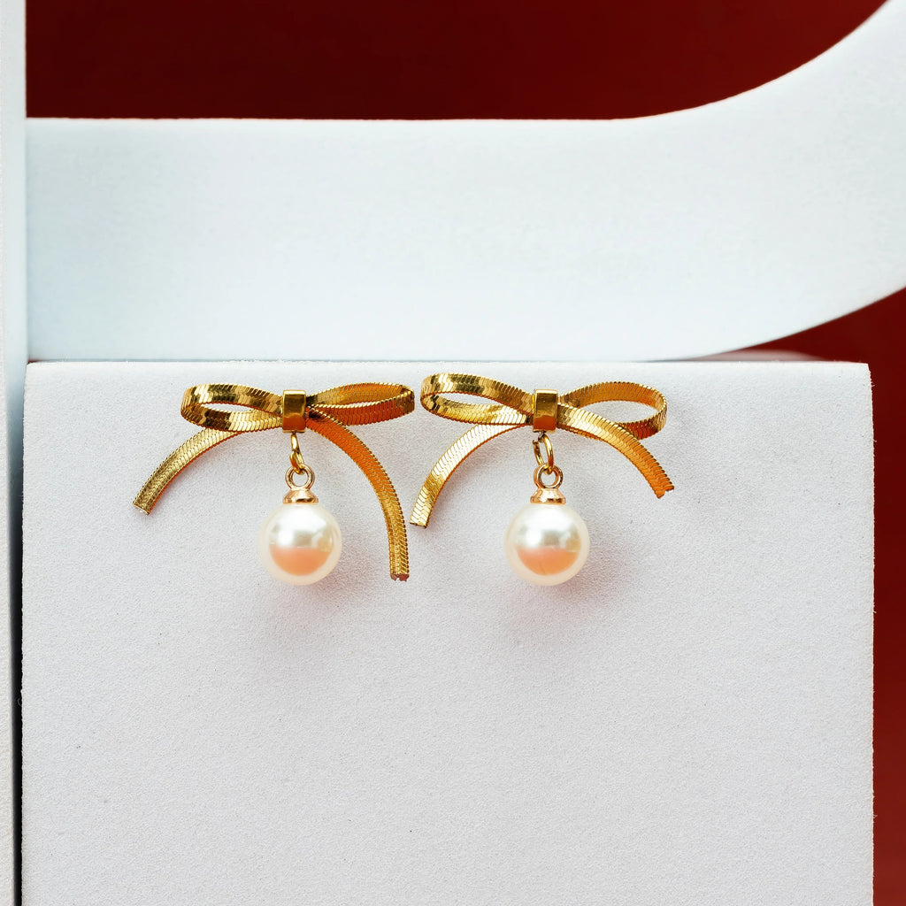 Pearl studded bow dangling Earring - Demifine 18KT Gold Plated