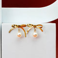 Pearl studded bow dangling Earring - Demifine 18KT Gold Plated